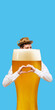 © master1305 - Playful man behind giant beer glass makes heart gesture under festive hat. Concept of beer appreciation, Oktoberfest humor, fan culture and seasonal event promotion.