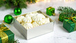 © chrystal - Coconut meringue cookies in a gift box. Ai