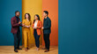 © Maksym - Diverse business professionals collaborating and talking in a modern office setting