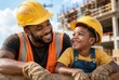 © Olga Ко - > Happy African American construction worker father and little son in yellow hard hats smiling at a building site. Family bonding, Labor Day, and International Men's Day concept