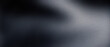 © Santiago - Industrial corrugated metal texture with vertical lines and dramatic lighting. Dark metallic background with silver highlights. Abstract steel surface for architectural and automotive design.