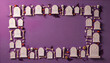 © Mstsonia - 3D Halloween graveyard border with tombstones and bones on a purple background