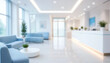 © Imon Pixels - Blurred interior view of a modern bright hospital lobby with waiting area and reception desk