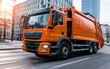© Oleksiy - Orange garbage truck driving through an urban street in bright daylight.