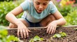 © Angavlan - Young girl participates in child gardening near rich soil in vegetable bed. Active child gardening involves touching fertile earth and green sprouts. Creative child gardening concept for eco ads.