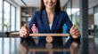 © Panpatsa - Equal gender balance concept featuring a wooden seesaw with male and female symbols.