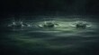 © baskara - Three water drops create concentric ripples and splashes on a dark, reflective surface