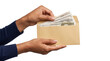 © Abdulmalek - Money envelope held in hands with cash bills pulled out showing a salary payment or bribe concept use PNG, Transparent Background