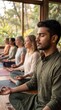 © cloud7days - Young South Asian Male Leading Group Meditation Session