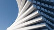 © ilham - 3D abstract dynamic geometric spiral rendering with white modern blocks against blue sky. Ideal background for architectural, tech, modern business presentations, websites, and minimalist covers