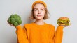 © M - Healthy food choice, woman holding broccoli and burger, nutrition dilemma and diet concept