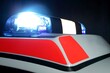 © Photoby - Sondersignal Totale, Blaulicht Einsatzfahrzeug Rettungsdienst und Katastrophenschutz. Studioaufnahme vor dunklem Hintergrund.