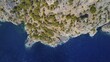 © Ralf Adler/imageBROKER - Drone image, aerial view of a rocky coast with blue sea water and sparse vegetation, drone image, rocky coast, east coast, Karpathos, Dodecanese, Greek Islands, Greece