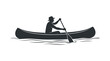 © Jacksn - Silhouette of a person in a canoe rowing on water