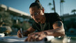 © BlackBridge Media - Focused Male Architect Sketching Design Blueprints Outdoors in Sunlight