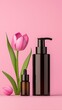 © Blame - Cosmetic pump and dropper bottles with pink tulips.
