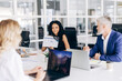 © Maria Vitkovska - Businesswoman presenting project schedule during office meeting