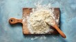 © Margarita Vais  - White baking flour pile on rustic wooden cutting board with spoon. Suitable for bakery shop promotion banner, home baking recipe blog layout or organic food grocery advertisement