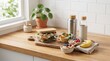 © Shahriar - Healthy lunch prep containers with fresh vegetables fruit and balanced snacks set on wooden kitchen counter for meal planning diet tracking and mindful eating.