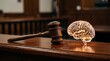 © Abu - Wooden gavel and glowing transparent brain icon on polished courtroom bench symbolizing legal justice intelligence neuroscience law concept close up warm tones shallow depth