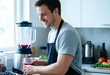© Pixel-Shot - Healthy lifestyle and nutrition, man preparing fresh berry smoothie in kitchen for wellness and diet with blender and organic fruit for breakfast routine