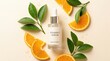 © rezaul4022 - Vitamin C serum bottle with fresh orange slices and green leaves on a soft beige background