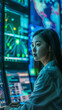 © Siriluck - Young Asian female IT specialist monitoring big data analytics on multiple screens in cyber security command center, generative AI