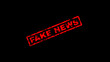© MstMoriom - Red fake news rubber stamp mark on black background