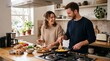 © creativestock - Happy couple preparing breakfast together in a bright modern kitchen cooking eggs and avocado toast
