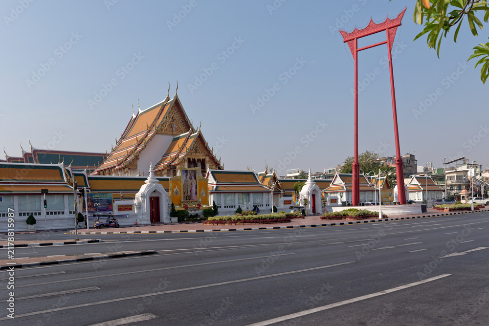 Extented Structure Photo Famous Giant Swing red teak structure and Wat Suthat temple against ...