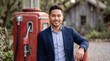 © cloud7days - Young Southeast Asian Professional at Vintage Gas Pump