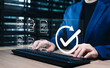 © Sandwish - Document Approval and Quality Assurance Process Concept. Businesswoman working on computer with icons of document review and check mark, symbolizing document validation, compliance, approval workflow