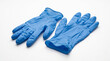 © Fernando Sanso - Pair of blue latex medical surgical gloves isolated on white.