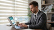 © PhotoArtHub - Man in suit using laptop showing online learning progress, symbolizing education, career growth, and digital advancement