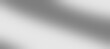 © Valiantsina - Silver foil texture background with light reflection. Christmas gift background