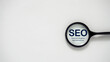© NAZ - SEO Search Engine Optimization Concept with Magnifying Glass for Website Visibility, Online Search Ranking and Digital Marketing Strategy