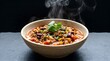 © digital pic - Steaming bowl of spicy chili con carne with beans and cilantro on a dark rustic table