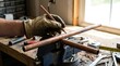© Nurul - Hand marking copper pipe on workbench with pencil.