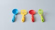 © Ali - toy utensils isolated on soft blue