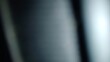 © Hokyubi - Abstract dark background featuring soft light gradients with blurred textures and deep moody shadows for professional creative graphic design projects