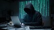 © Pipit - Hacker in dark room working on laptop with digital code background