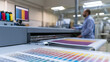 © photo for everything - Professional print shop worker operate industrial large format printer machine for commercial press production in modern manufacturing plant