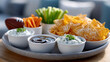 ©  VladaToday - Round tray with multiple dips chips celery and carrot sticks for sports party platter background and snack table banner design