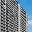 © 행운 행 - 높고 모던한 디자인의 현대식 아파트 외관 풍경Modern apartment exterior scenery with high and modern design