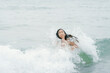 © Felipe Barrera/Stocksy - Child playing in ocean waves having fun