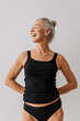 © BONNINSTUDIO/Stocksy - Senior woman laughing enjoying life aging gracefully with joy
