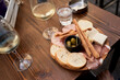 © Studio Sincère/Stocksy - Classical Aperitivo a Table With Food and Drinks at a Local Spot