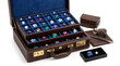 © MD ABU SADIK GAZI - Luxury leather briefcase filled with assorted precious gemstones
