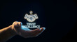 © Pixolia Stock - Human hand holding glowing handshake icon representing trust