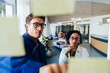 © Julia - Man and woman work together in office